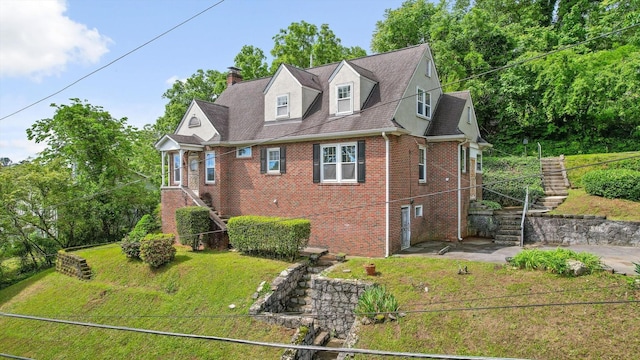 20 Ridge Rd, Chattanooga, TN 37411 - cape cod house with stairway, brick siding, a chimney, and a front lawn