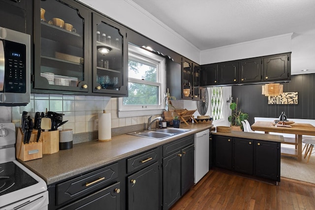 4338 Comet Trl, Hixson, TN 37343 - kitchen featuring white appliances, dark wood-style flooring, glass insert cabinets, backsplash, and ornamental molding