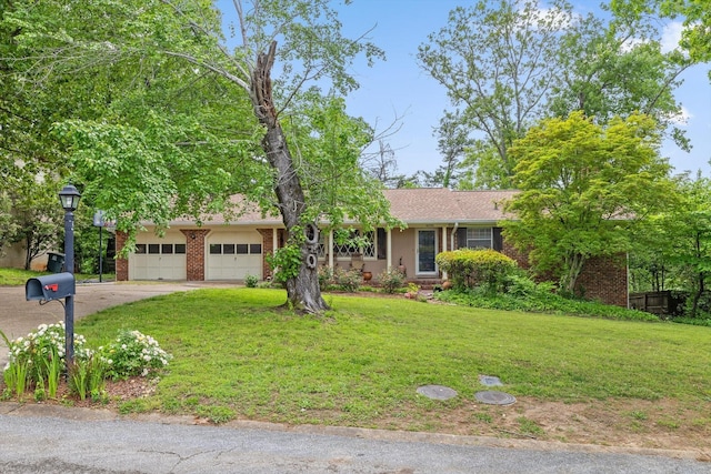 4338 Comet Trl, Hixson, TN 37343 - single story home featuring a front yard, brick siding, driveway, and a garage