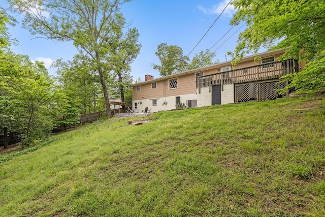 4338 Comet Trl, Hixson, TN 37343 - rear view of house featuring a chimney and a wooden deck