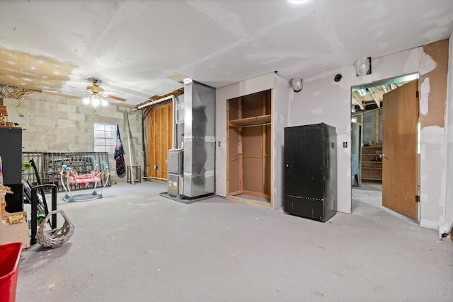553 Back Valley Rd, Trenton, GA 30752 - below grade area with ceiling fan and heating unit