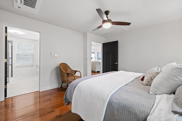 216 Trenton St, Chattanooga, TN 37415 - bedroom featuring wood finished floors, multiple windows, and ceiling fan