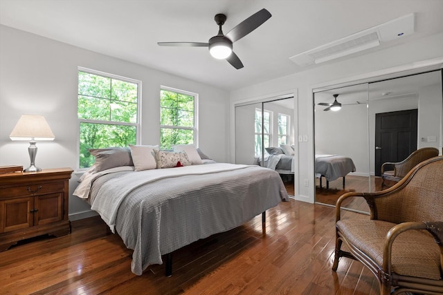 216 Trenton St, Chattanooga, TN 37415 - bedroom with multiple closets, hardwood / wood-style floors, multiple windows, and a ceiling fan