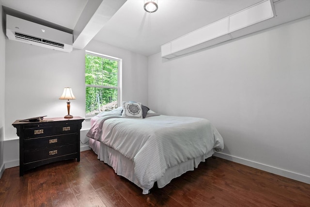 216 Trenton St, Chattanooga, TN 37415 - bedroom with an AC wall unit and dark wood-type flooring