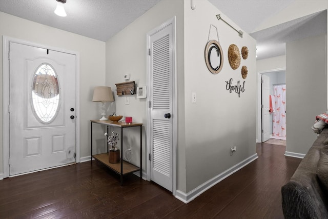 225 Shawn Ln, Chatsworth, GA 30705 - entryway featuring dark wood-style flooring and a textured ceiling