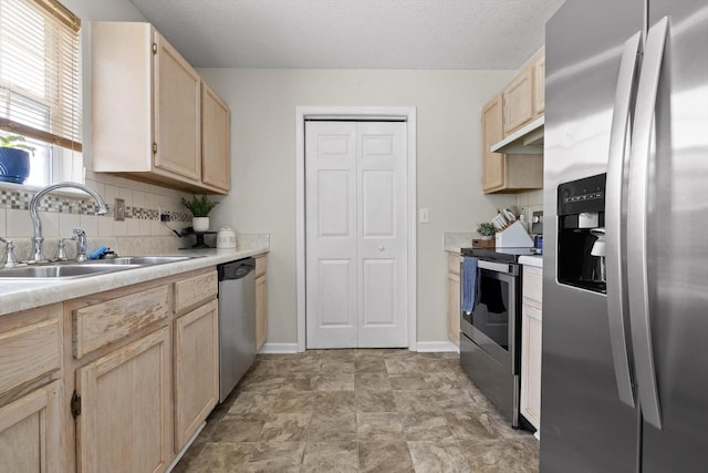 225 Shawn Ln, Chatsworth, GA 30705 - kitchen featuring stainless steel appliances, light brown cabinets, under cabinet range hood, backsplash, and light countertops