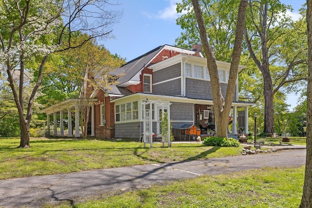 302 S Main St, La Fayette, GA 30728 - shingle-style home with a front yard and covered porch