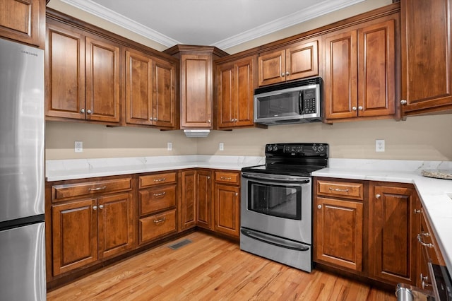 6970 Bullock Way, Hixson, TN 37343 - kitchen featuring stainless steel appliances, crown molding, light wood-style flooring, and brown cabinetry