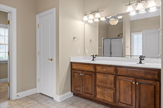 6970 Bullock Way, Hixson, TN 37343 - bathroom featuring double vanity, tile patterned flooring, and a shower with shower door