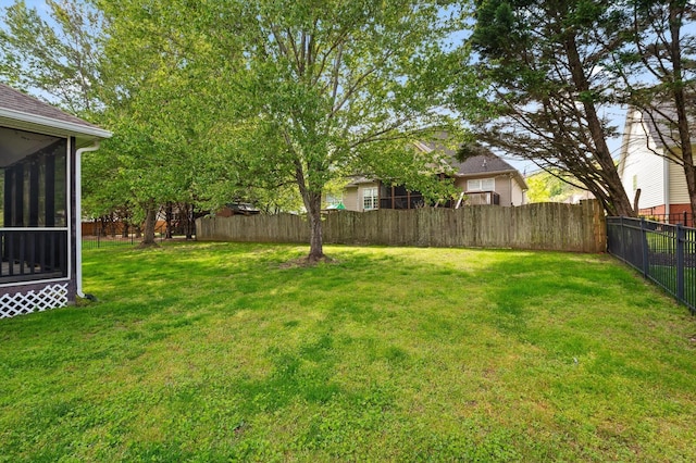 6970 Bullock Way, Hixson, TN 37343 - fenced backyard with a sunroom