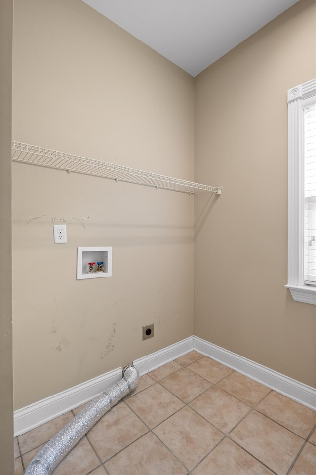 6970 Bullock Way, Hixson, TN 37343 - washroom with hookup for an electric dryer, washer hookup, and light tile patterned flooring
