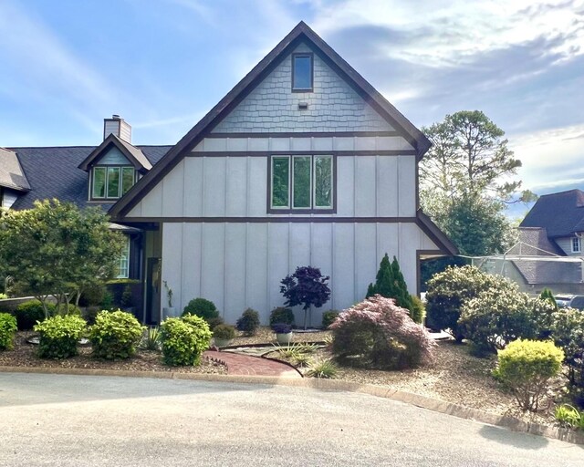 467 Wisley Way, Ringgold, GA 30736 - view of property exterior featuring board and batten siding and a chimney