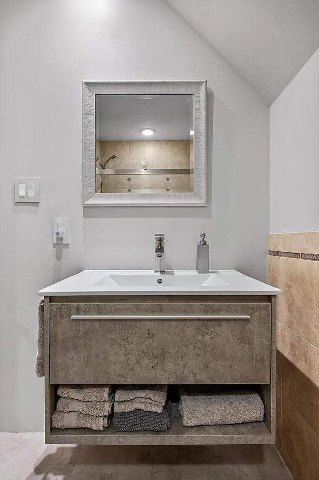 467 Wisley Way, Ringgold, GA 30736 - bathroom featuring lofted ceiling and vanity