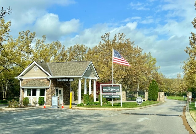 467 Wisley Way, Ringgold, GA 30736 - view of asphalt road featuring curbs and a gated entry