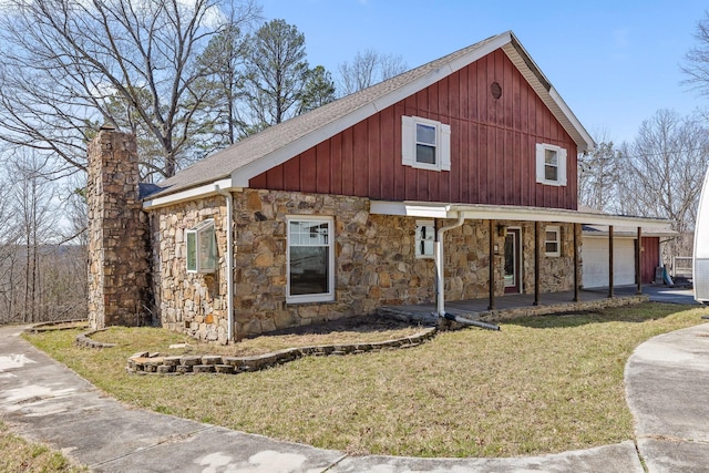 610 Orme Mountain Rd, South Pittsburg, TN 37380 - view of front of home featuring stone siding, covered porch, a garage, and a front yard