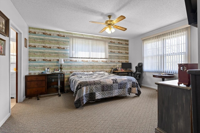 3216 Cleveland Hwy, Dalton, GA 30721 - carpeted bedroom featuring multiple windows, wallpapered walls, a desk, a textured ceiling, and an accent wall
