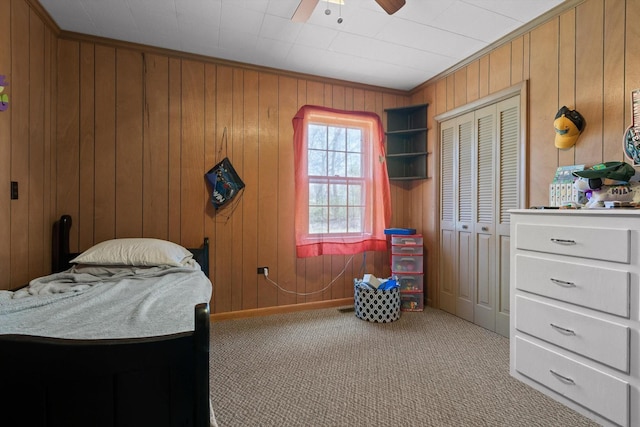 3216 Cleveland Hwy, Dalton, GA 30721 - bedroom featuring carpet floors, wooden walls, a closet, and ceiling fan