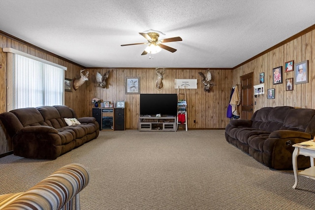 3216 Cleveland Hwy, Dalton, GA 30721 - carpeted living room featuring a ceiling fan, ornamental molding, a textured ceiling, wood walls, and beverage cooler