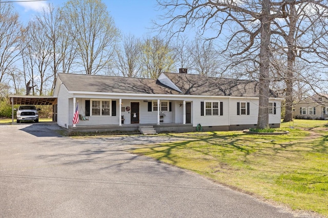 3216 Cleveland Hwy, Dalton, GA 30721 - view of front of home with crawl space, asphalt driveway, a porch, a chimney, and a front lawn