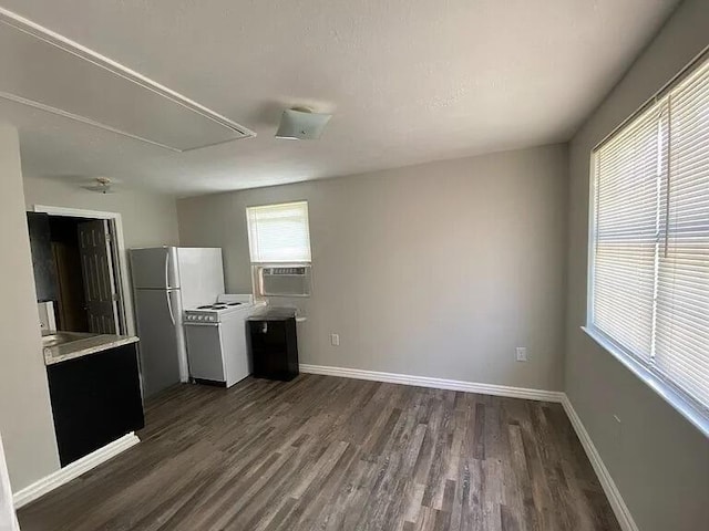 604606 N Moore Rd, Chattanooga, TN 37411 - kitchen featuring white appliances, dark wood finished floors, light countertops, and cooling unit