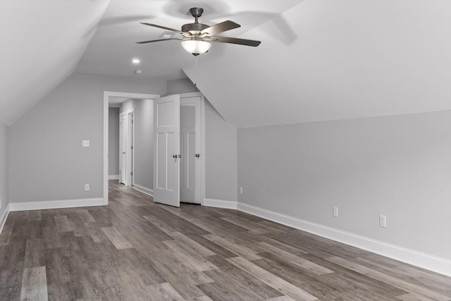 9614 Mulberry Gap Way, Ooltewah, TN 37363 - additional living space with a ceiling fan, vaulted ceiling, and wood finished floors