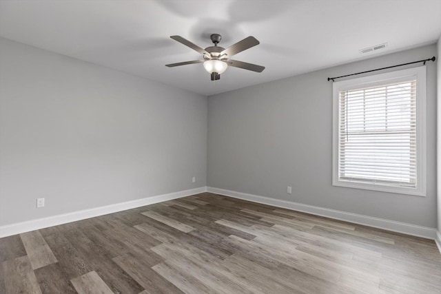 9614 Mulberry Gap Way, Ooltewah, TN 37363 - spare room featuring ceiling fan and wood finished floors