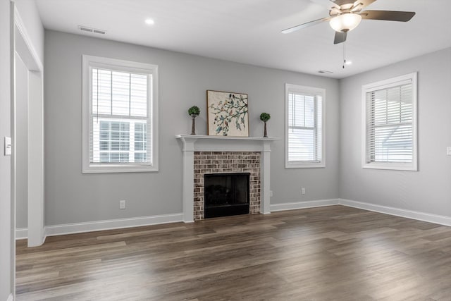 9614 Mulberry Gap Way, Ooltewah, TN 37363 - unfurnished living room featuring ceiling fan, wood finished floors, a brick fireplace, and recessed lighting
