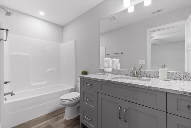9614 Mulberry Gap Way, Ooltewah, TN 37363 - full bath featuring wood finished floors, vanity, and shower / washtub combination