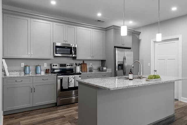9614 Mulberry Gap Way, Ooltewah, TN 37363 - kitchen with appliances with stainless steel finishes, gray cabinets, dark wood-type flooring, recessed lighting, and a center island with sink