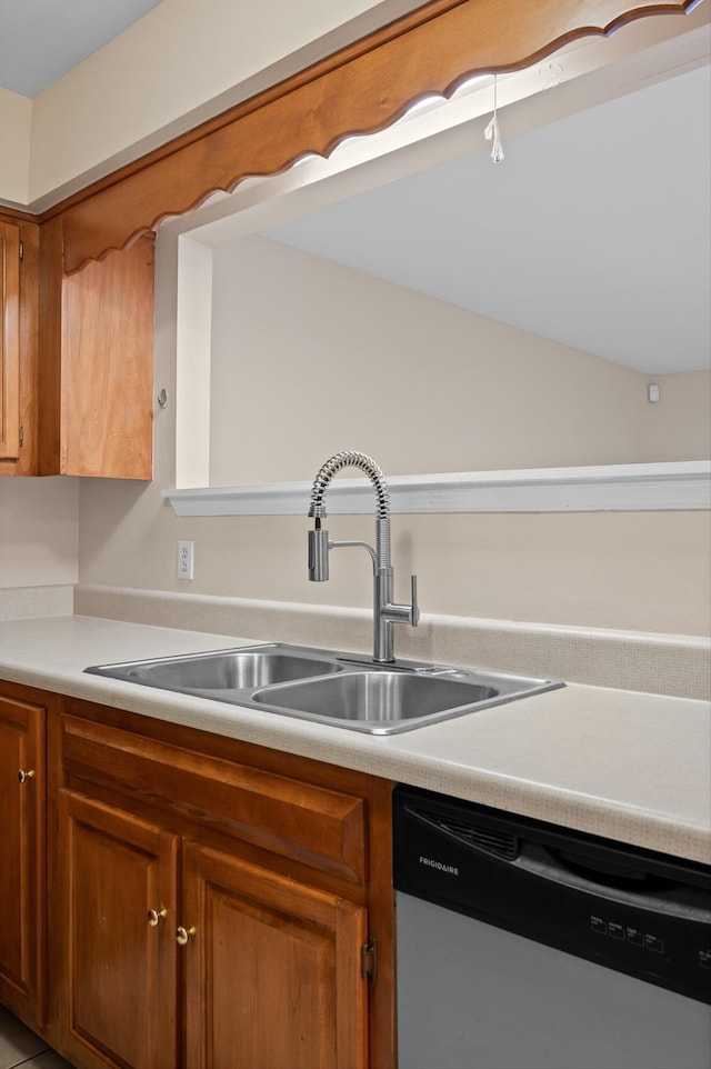 6585 Hickory Trace Cir, Chattanooga, TN 37421 - kitchen featuring dishwasher, light countertops, and brown cabinets