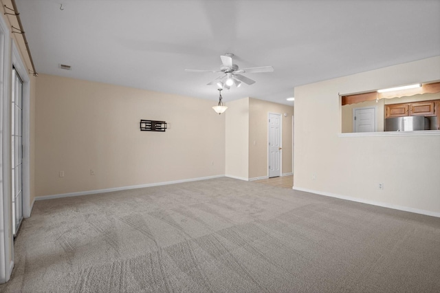 6585 Hickory Trace Cir, Chattanooga, TN 37421 - unfurnished living room with a ceiling fan and light carpet