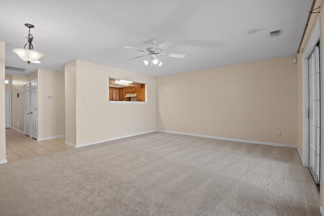 6585 Hickory Trace Cir, Chattanooga, TN 37421 - empty room featuring light colored carpet and a ceiling fan
