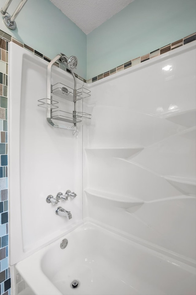 6557 Esquire Dr, Hixson, TN 37343 - full bath with bathtub / shower combination and a textured ceiling