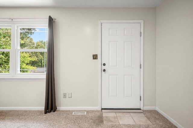 6557 Esquire Dr, Hixson, TN 37343 - foyer entrance featuring baseboards and light colored carpet