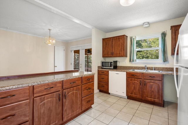 6557 Esquire Dr, Hixson, TN 37343 - kitchen featuring white appliances, brown cabinetry, light tile patterned floors, a textured ceiling, and a chandelier
