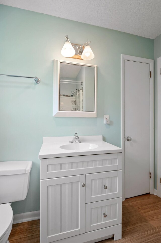6557 Esquire Dr, Hixson, TN 37343 - full bathroom featuring vanity, wood finished floors, and a shower with shower curtain