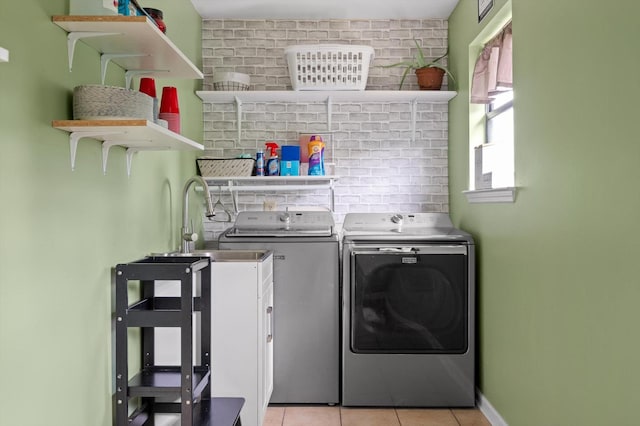 411 Meadow Green Dr, Ringgold, GA 30736 - laundry room featuring washer and dryer and light tile patterned flooring