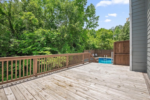 411 Meadow Green Dr, Ringgold, GA 30736 - wooden deck featuring a fenced backyard