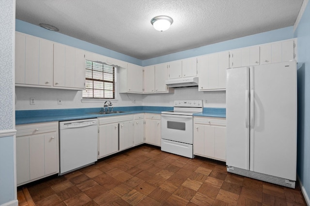 7622 Cove Ridge Dr, Hixson, TN 37343 - kitchen with white appliances, under cabinet range hood, a textured ceiling, and white cabinets
