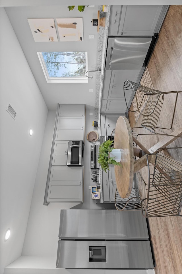 1946 Addi Ln, Chattanooga, TN 37421 - kitchen featuring a skylight and wood finished floors