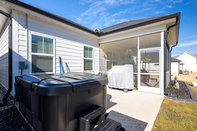 7183 Tailgate Loop, Ooltewah, TN 37363 - view of patio featuring a hot tub, a sunroom, and grilling area
