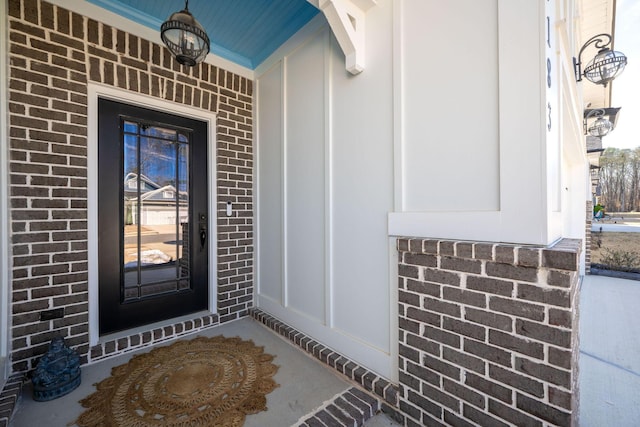 7183 Tailgate Loop, Ooltewah, TN 37363 - entrance to property with brick siding and a porch