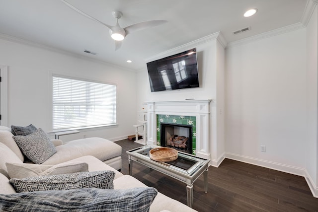 7183 Tailgate Loop, Ooltewah, TN 37363 - living area with ornamental molding, dark wood-type flooring, a fireplace, ceiling fan, and recessed lighting