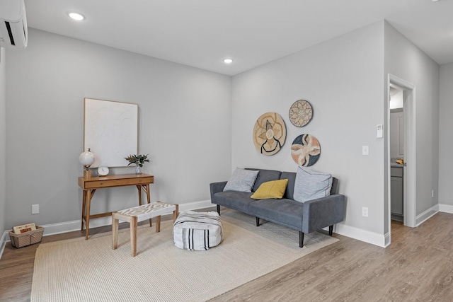 1866 Addi Ln, Chattanooga, TN 37421 - living area with a wall mounted AC, light wood finished floors, and recessed lighting