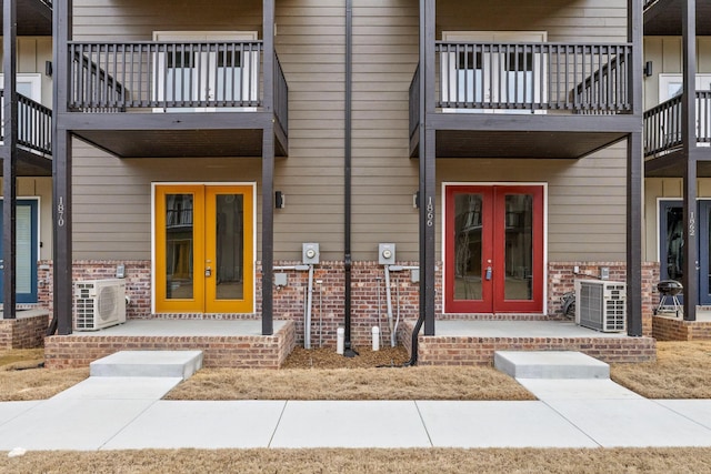 1866 Addi Ln, Chattanooga, TN 37421 - property entrance featuring french doors, a balcony, and brick siding