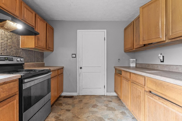 608 Parkview Dr, Chattanooga, TN 37411 - kitchen with electric range, ventilation hood, tasteful backsplash, stone finish flooring, and light countertops