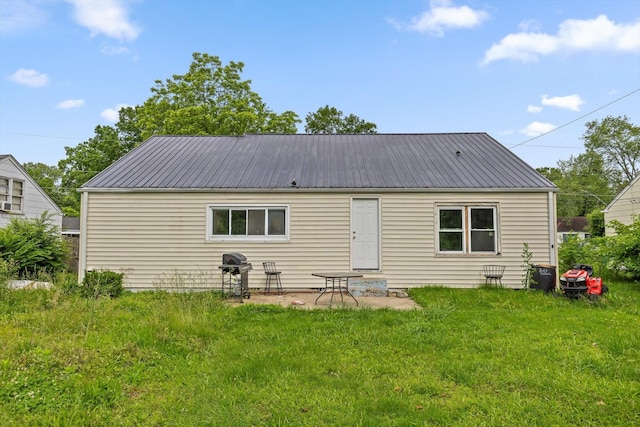 608 Parkview Dr, Chattanooga, TN 37411 - rear view of house featuring a metal roof, a yard, and a patio