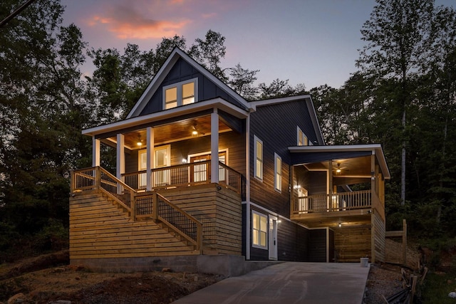 5509 Alabama Ave, Chattanooga, TN 37409 - view of front of property featuring covered porch, stairs, and board and batten siding