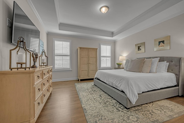 7192 Winfrey Dr, Fairview, TN 37062 - bedroom with a raised ceiling, wood finished floors, and crown molding
