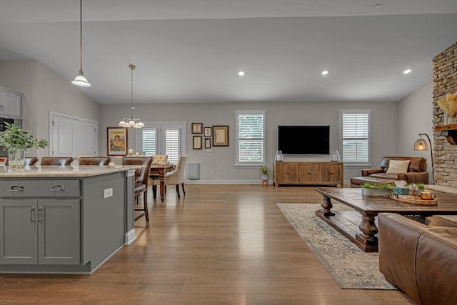 7192 Winfrey Dr, Fairview, TN 37062 - living area with plenty of natural light, light wood-style flooring, a chandelier, recessed lighting, and vaulted ceiling